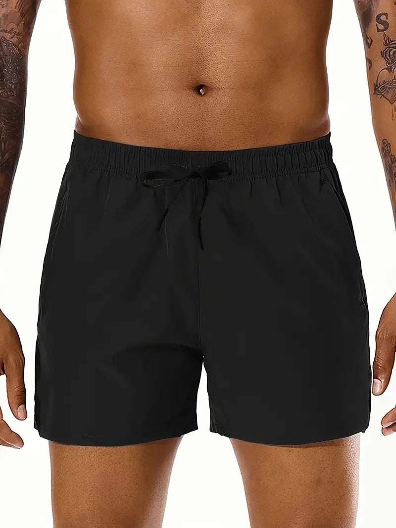 Men Solid Color, Elastic Waist Double Pockets Sports Shorts