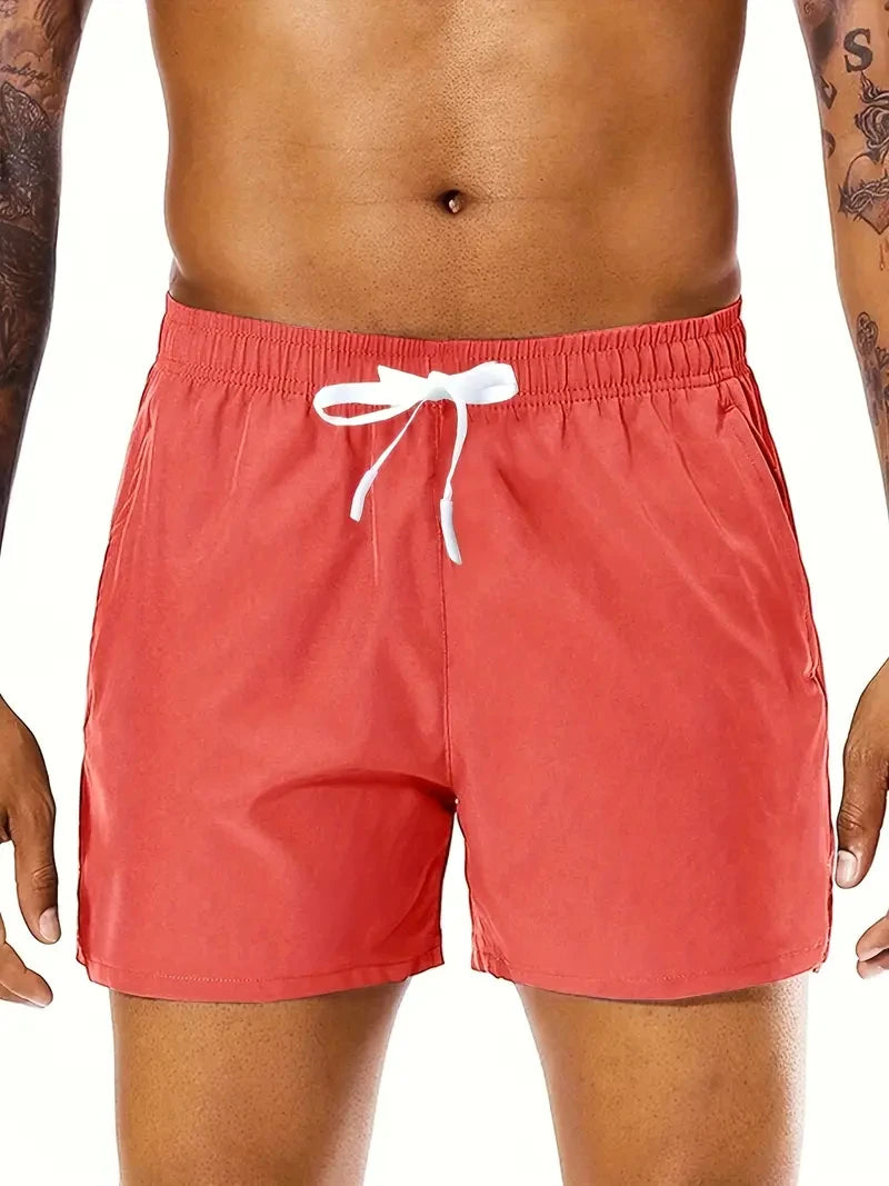 Men Solid Color, Elastic Waist Double Pockets Sports Shorts