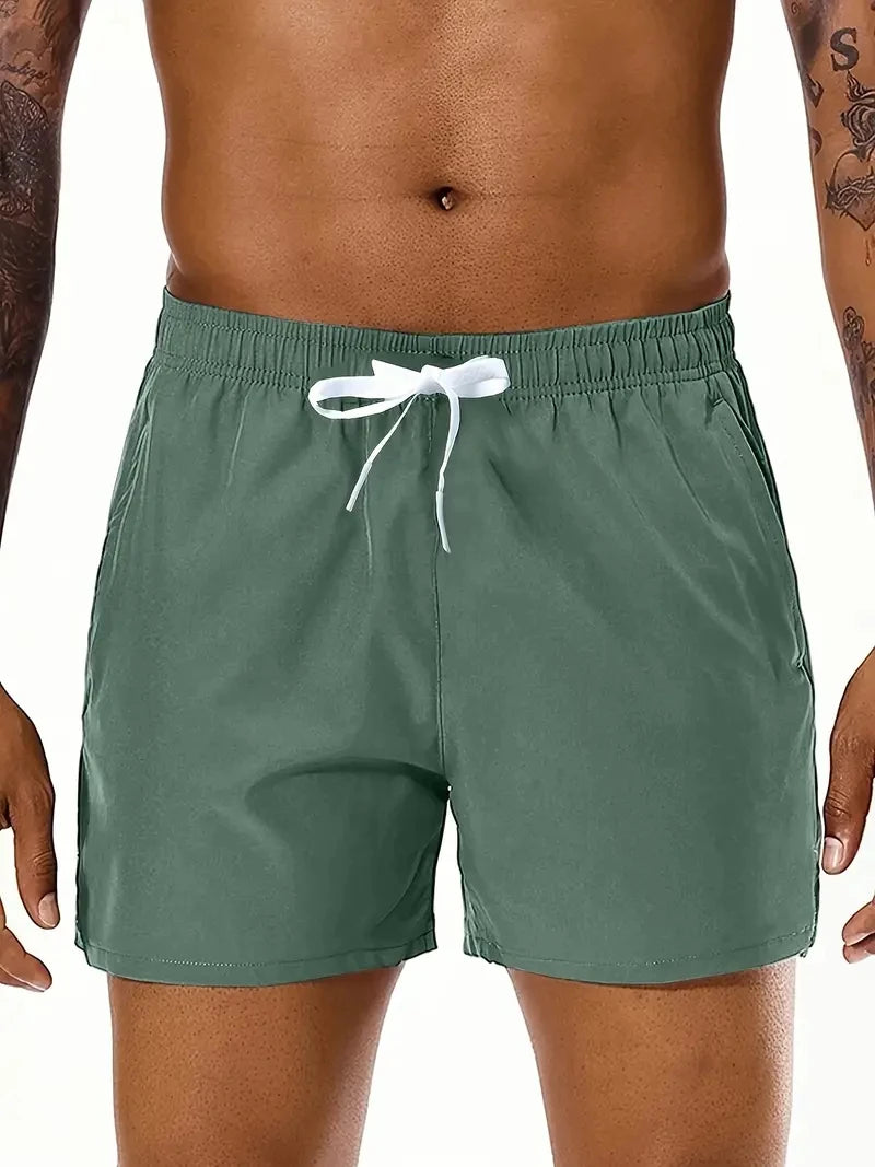 Men Solid Color, Elastic Waist Double Pockets Sports Shorts