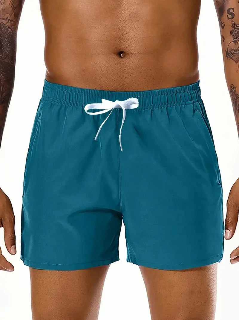 Men Solid Color, Elastic Waist Double Pockets Sports Shorts